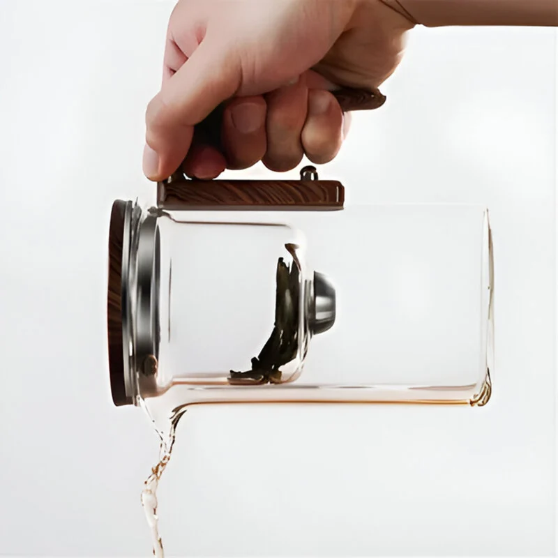 Elegant glas teekande med si - Stilfuldt design til løs te