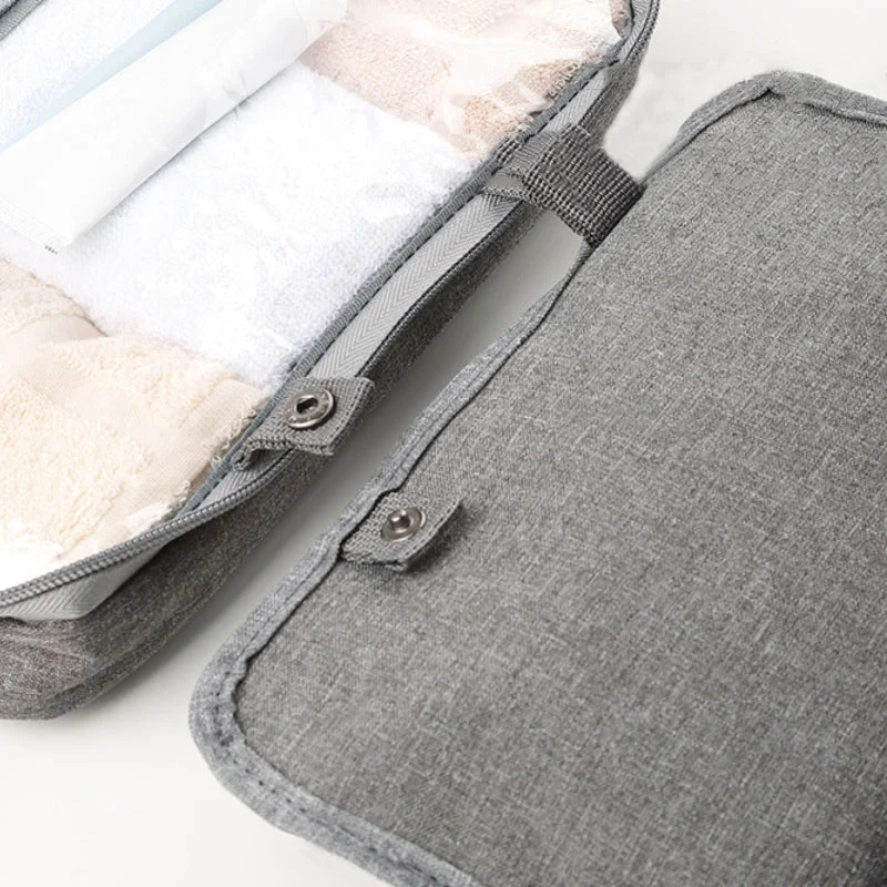 RejseCosmetic Organizer | Kompakt og Vandtæt | 4 Rum med 360° Hængelås