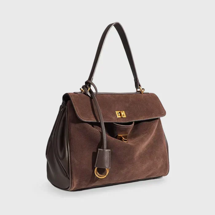 Elegant skuldertaske i luksuriøst mikrofiber med veganske detaljer