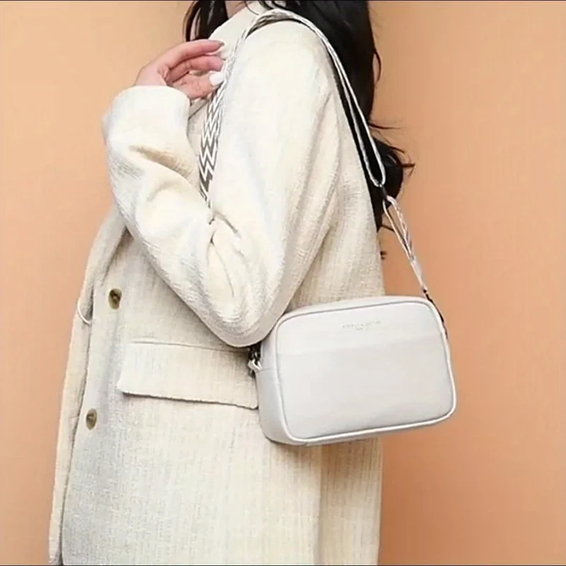 Elegant lædercrossbody-taske – Funktionel og stilfuld med justerbar rem