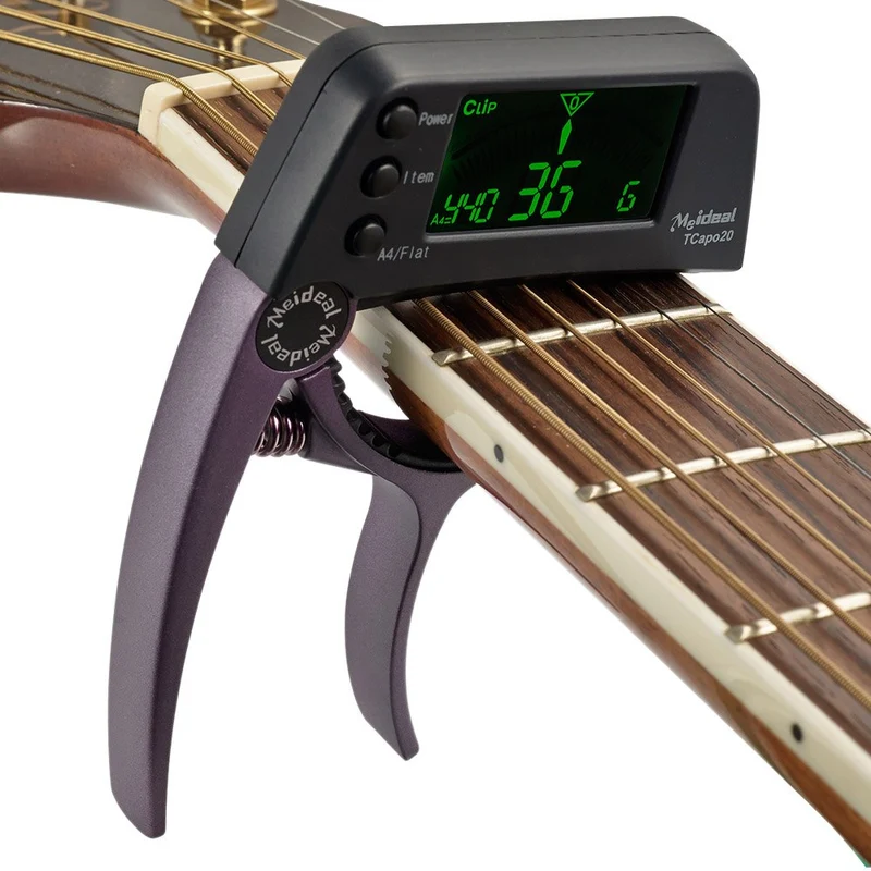 Kombineret Capo og Tuner – StrengFix