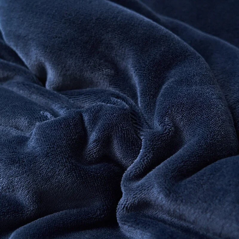 LuxeWool - Vendbar fleece tæppe til sofa eller seng