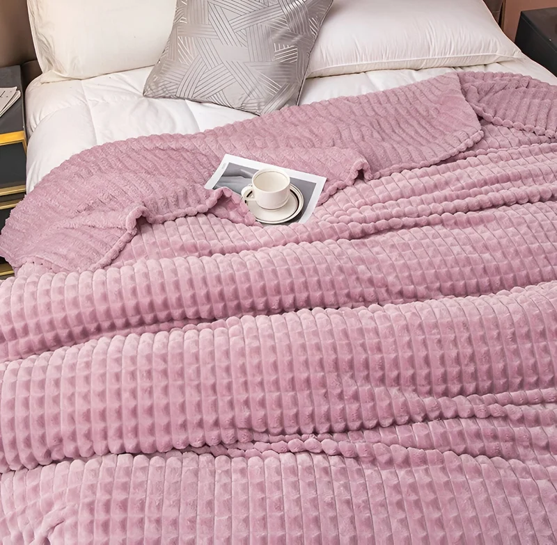 Ultrafluffy koralfarvet fleece-tæppe med struktureret plaid design