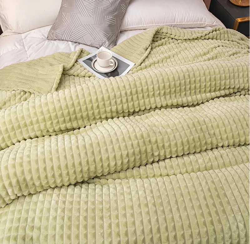 Ultrafluffy koralfarvet fleece-tæppe med struktureret plaid design