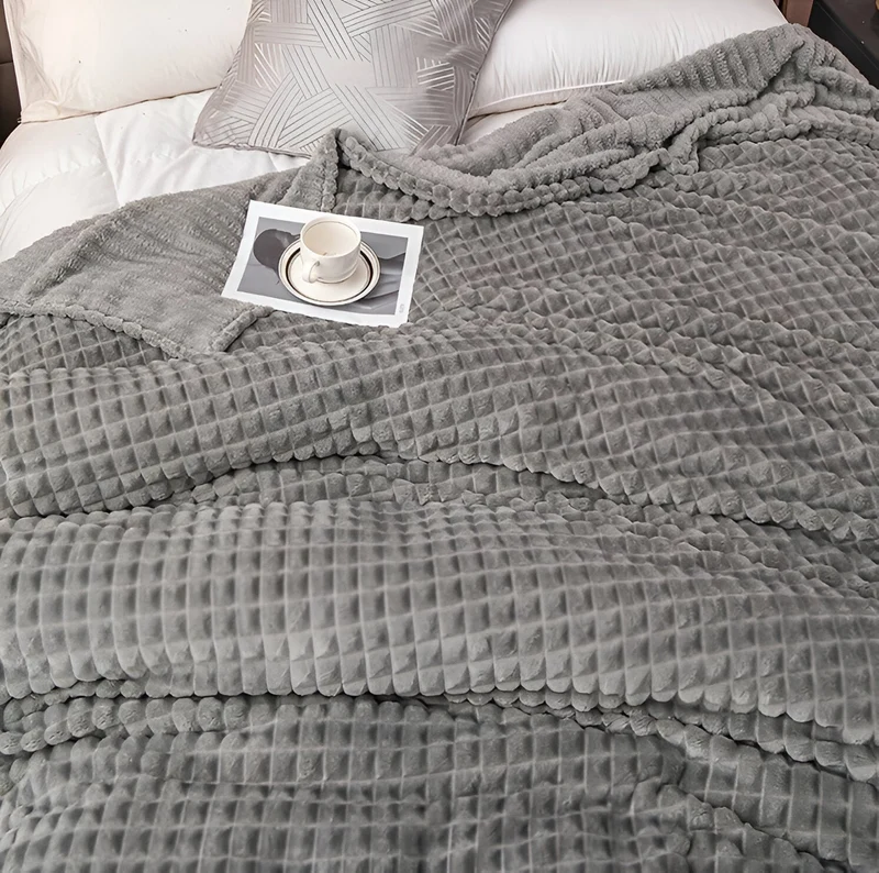 Ultrafluffy koralfarvet fleece-tæppe med struktureret plaid design