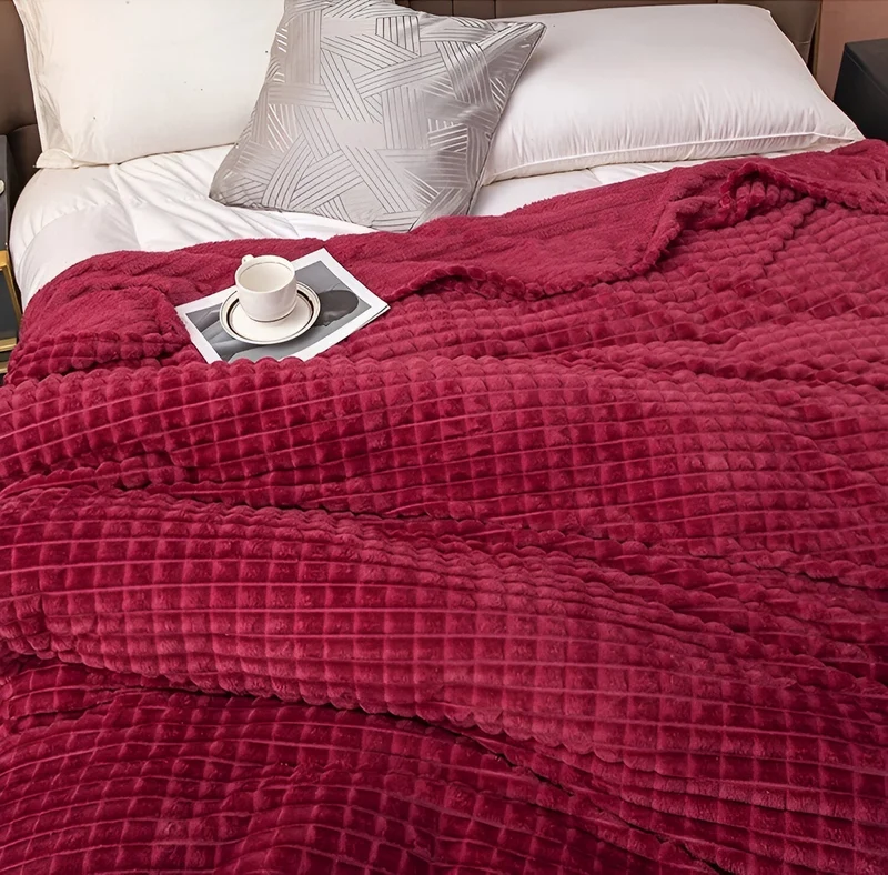 Ultrafluffy koralfarvet fleece-tæppe med struktureret plaid design