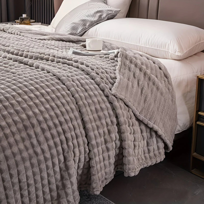 Ultrafluffy koralfarvet fleece-tæppe med struktureret plaid design