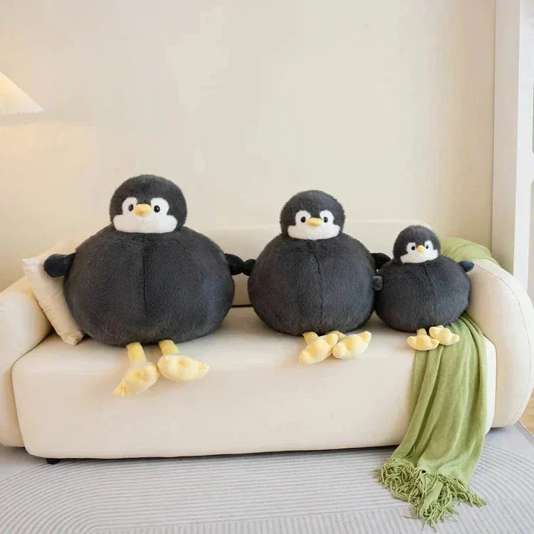 Fyldig rund pinguin krammedyr i blødt stof