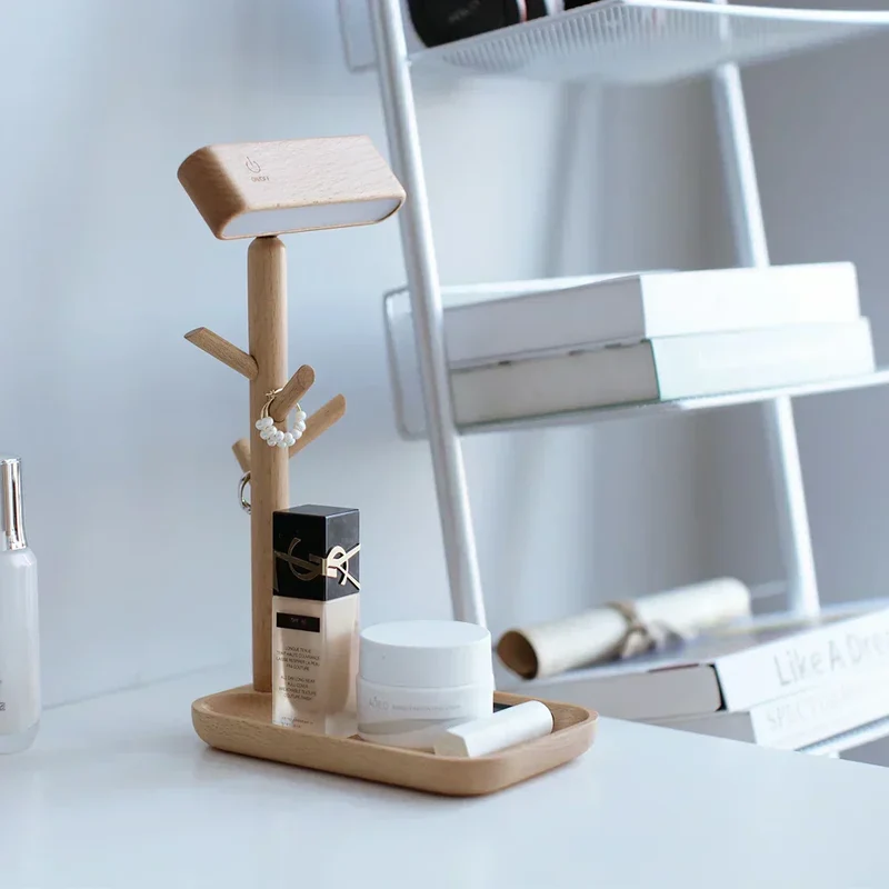 Elegant dæmpbar bordlampe med opbevaringsplads