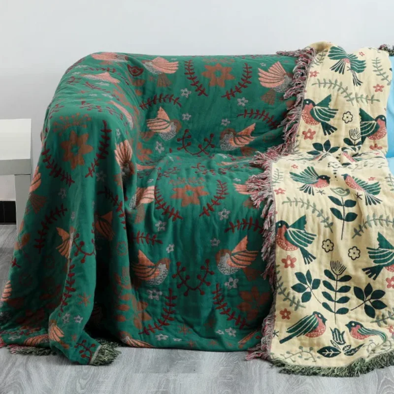 Vendbar plaid med fuglemotiv - Skandinavisk hygge til hjemmet