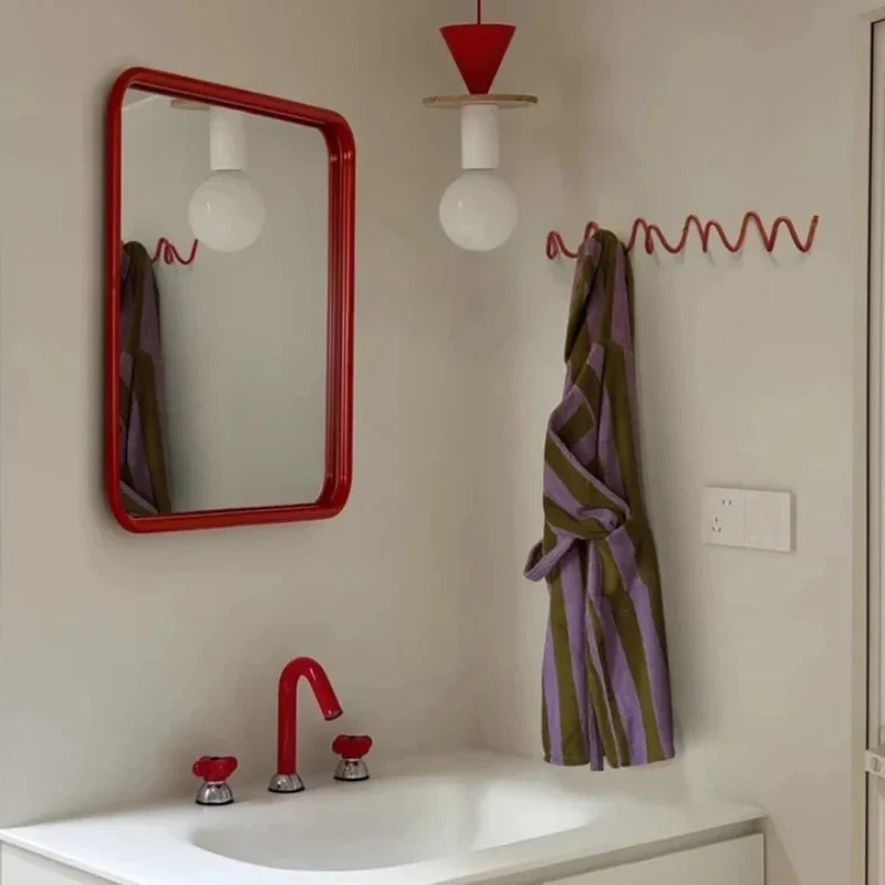 Elegant Sort Vægkrog i Smedejern til Moderne Indretning