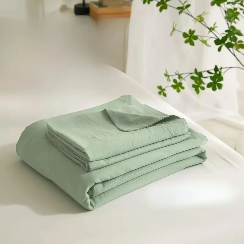 Stilrent, åndbart sengetøjssæt i lysegrøn polyester
