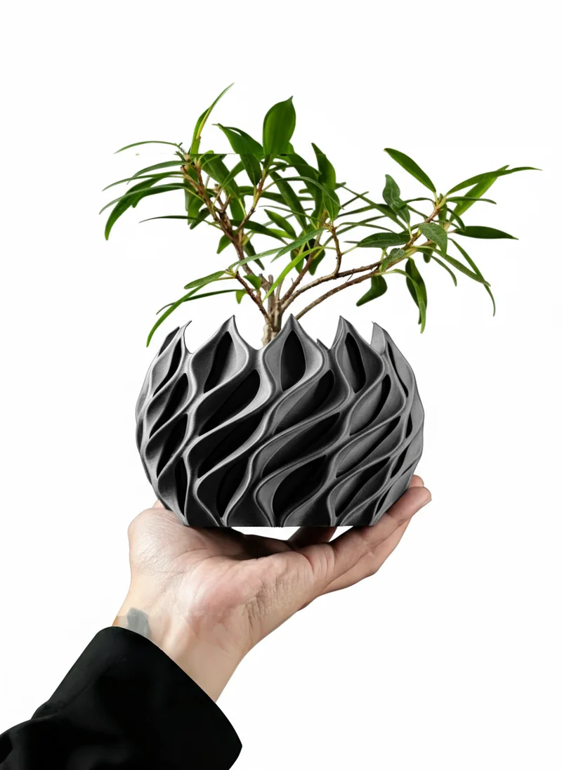 Geometrisk plantekrukke i bioplastik med unikt bølgedesign