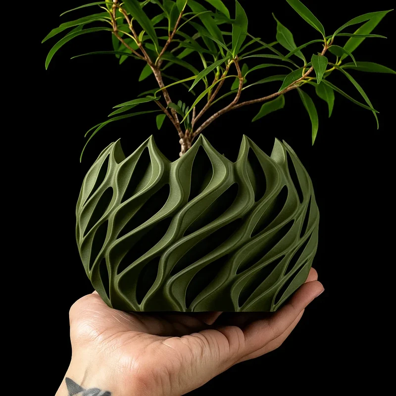 Geometrisk plantekrukke i bioplastik med unikt bølgedesign
