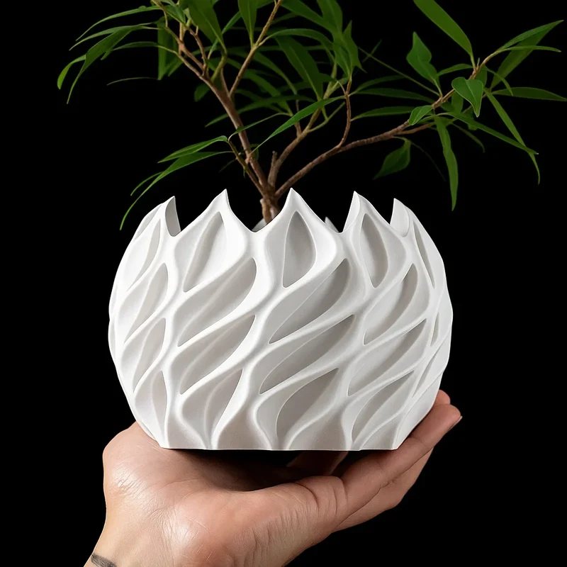 Geometrisk plantekrukke i bioplastik med unikt bølgedesign