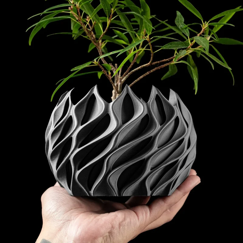 Geometrisk plantekrukke i bioplastik med unikt bølgedesign