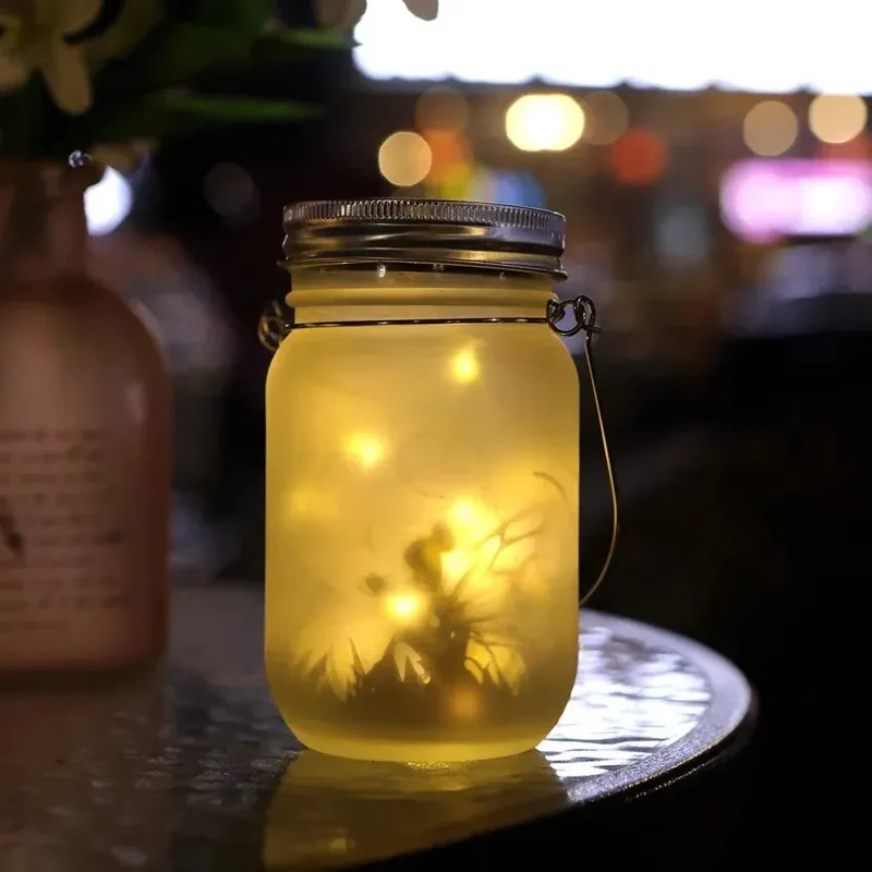 Solcellelanterne i Glas: Stemningsfuld Belysning til Haven