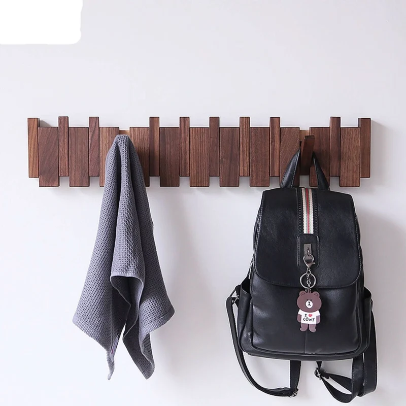 Foldbart Vægstativ i Træ med Unikt Piano-Inspireret Design
