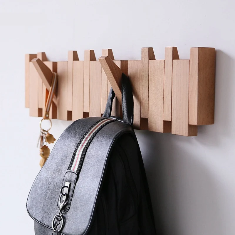 Foldbart Vægstativ i Træ med Unikt Piano-Inspireret Design