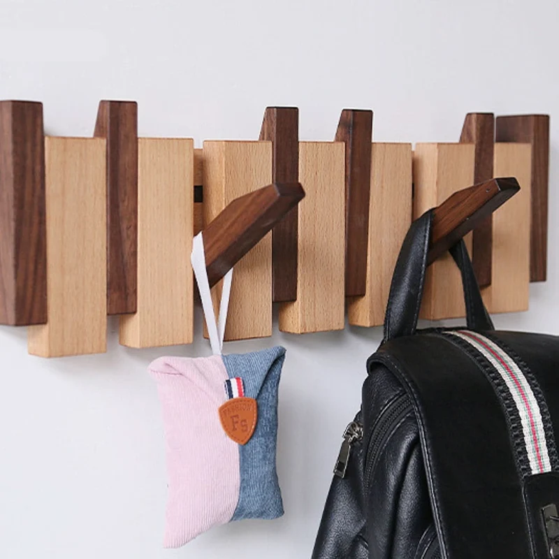 Foldbart Vægstativ i Træ med Unikt Piano-Inspireret Design