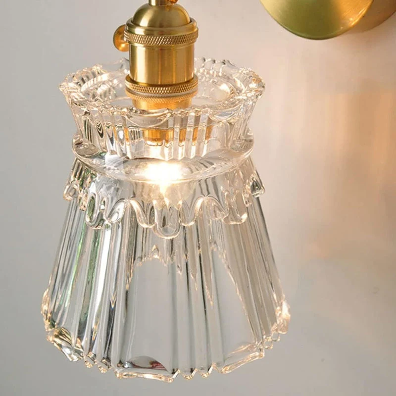 Elegant LED væglampe i klart glas for stemningsfuld belysning