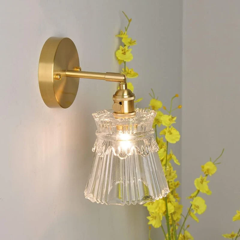 Elegant LED væglampe i klart glas for stemningsfuld belysning
