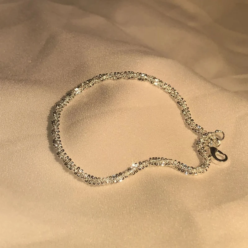 Elegant Sølv Armbånd med Vandinspireret Design, Perfekt Gave