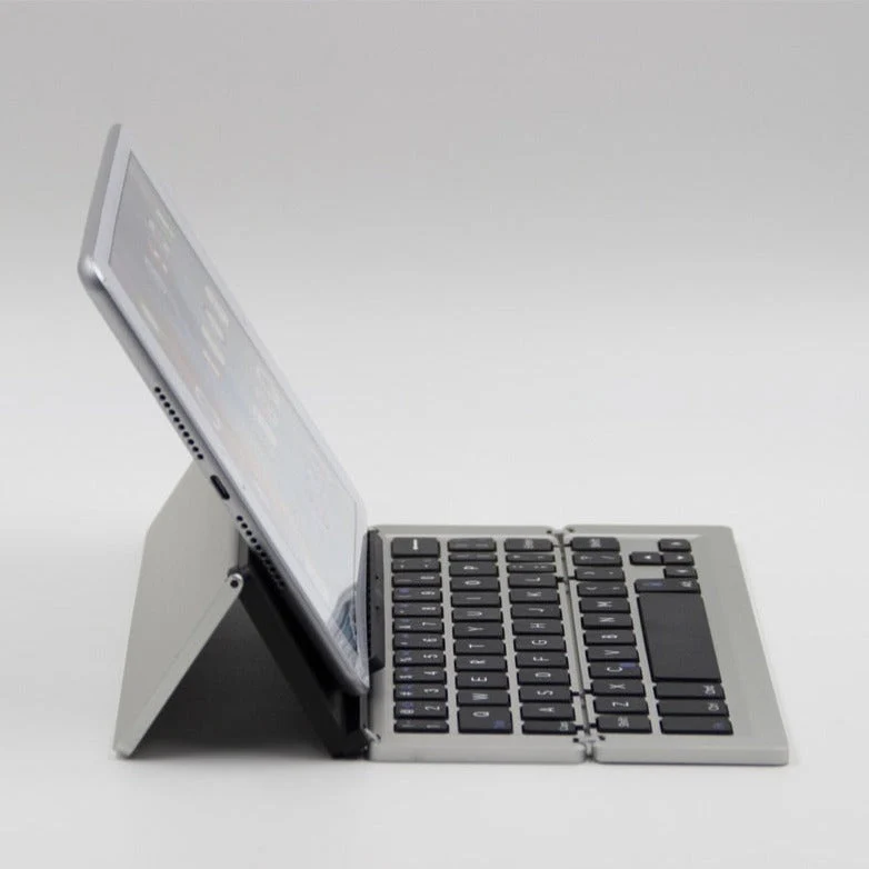 Bærbar trådløs sammenfoldelig tablet-holder tastatur