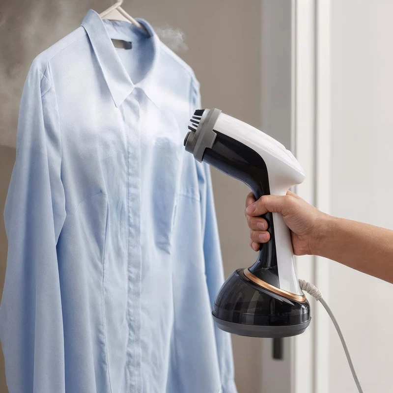 Nedis HHGS500 - Handheld kledingstomer - Compacte en krachtige kledingstomer voor op reis en thuis - 1700 W - 370 ml - Zwart/Wit